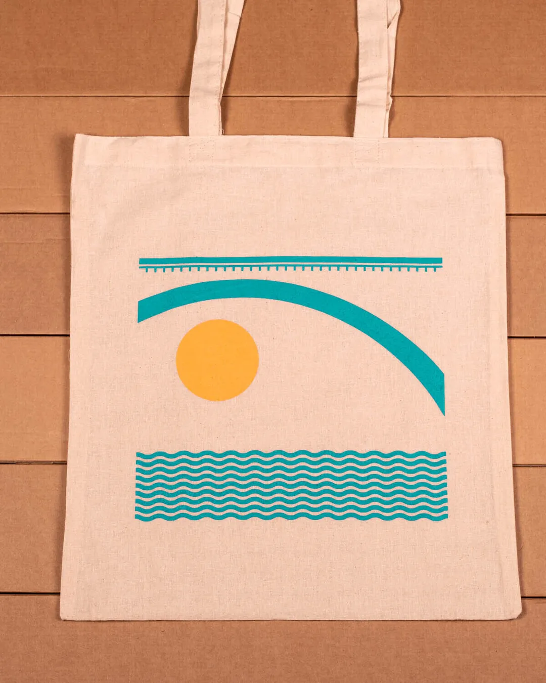 Baumwolltasche, Die Sonne unter der Brücke